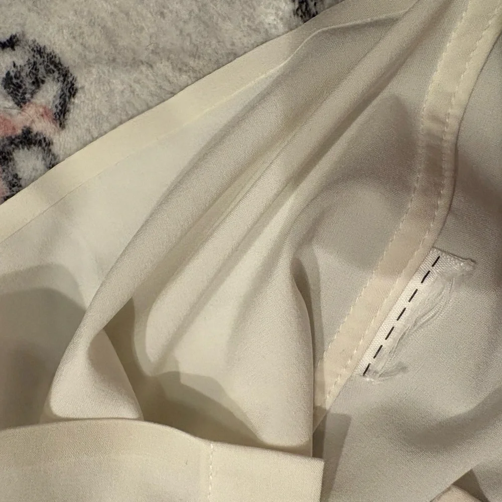 Athleta Sleeveless Ivory Button Down Blouse, size XS - Picture 3 of 7